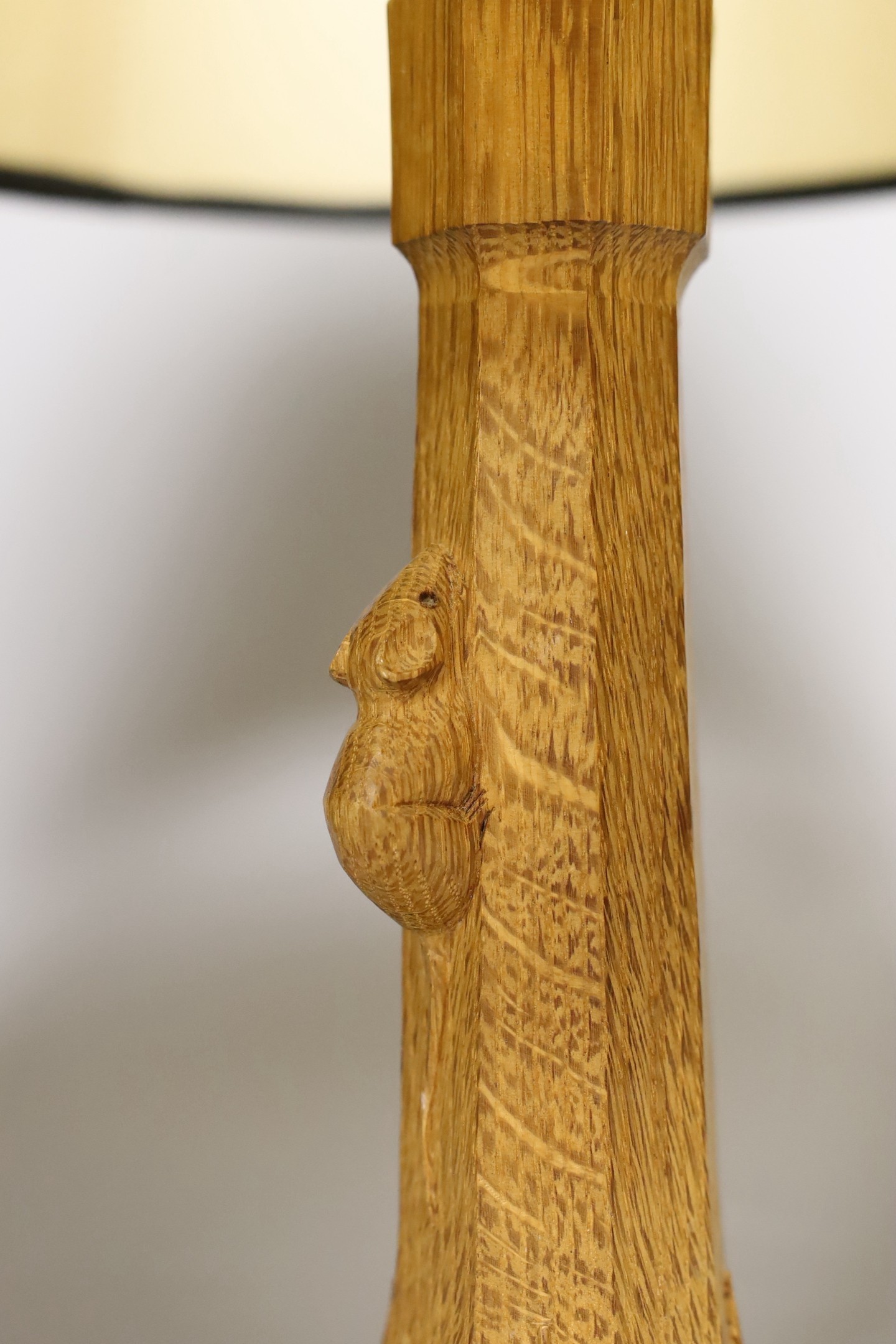 A carved oak Mouseman table lamp and shade, total height 45cm